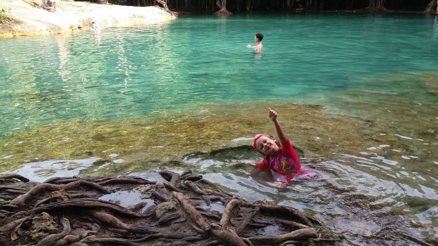 Little Miss arm raised, Emerald pools, Krabi Province, Thailand