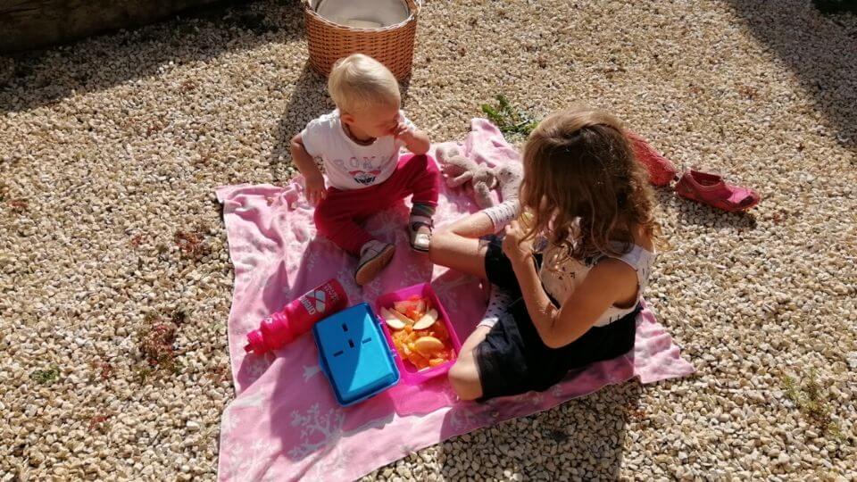 Things to do with kids at home-take a picnic outside