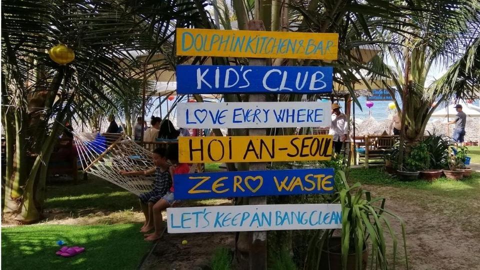 Things to do in Hoi An with kids-An Bang Beach-Dophin restaurant sign
