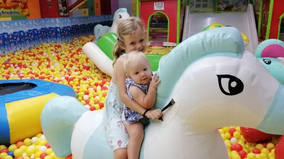 Things to do in Cebu City with kids-Ayala mall indoor playground-Ayla and Romy on unicorn
