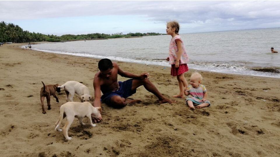 Things to do in Cebu City with kids-Pepito beach-Ayla, Romy, local man and furry friends