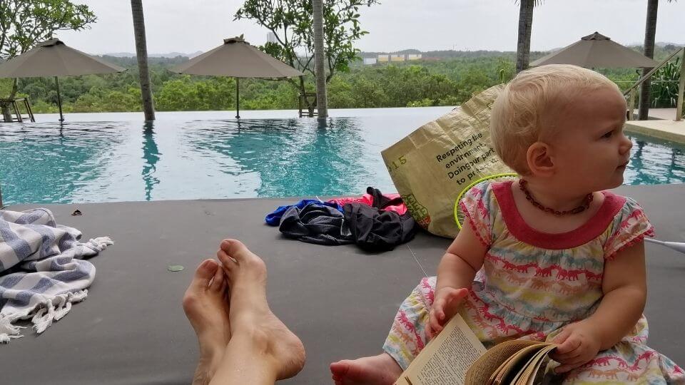 family friendly attractions in Johor Bahru-condo poolside relaxation Romy