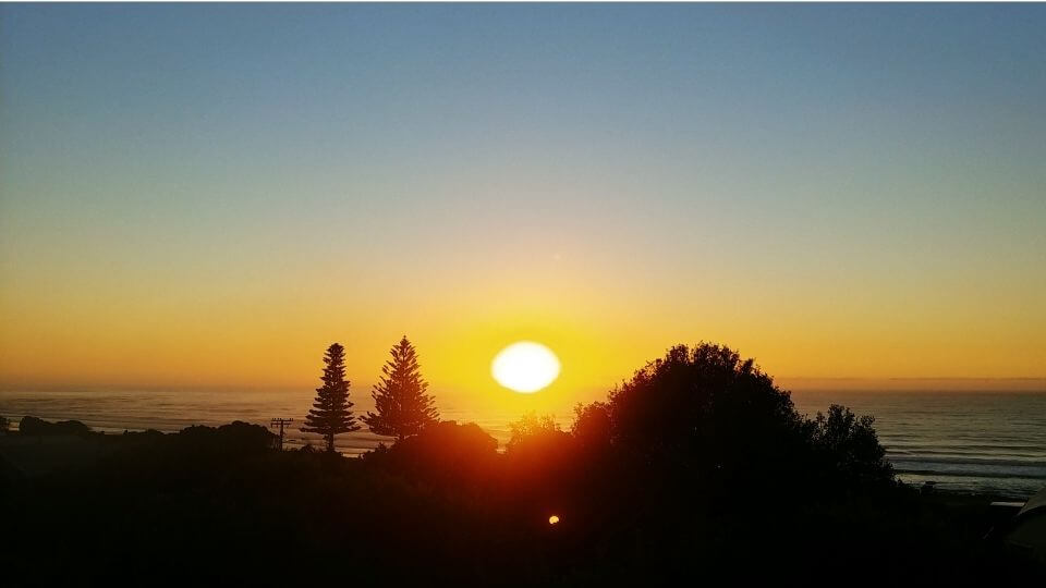 Things to do in Gisborne-watch the sunrise in the first city to see the sun-wainui beach view