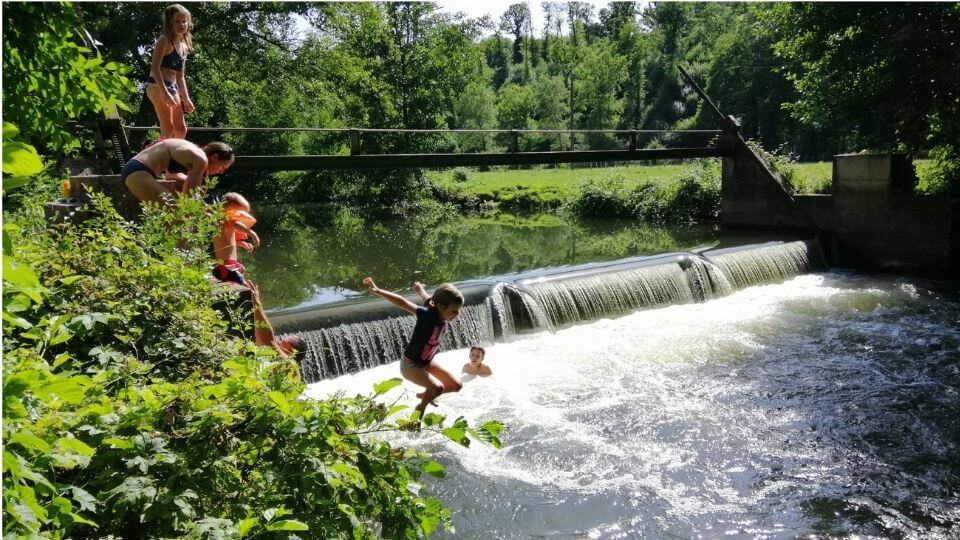 Things to do in Poitou Charentes-summer river swimming-Charroux-Ayla jumping in river