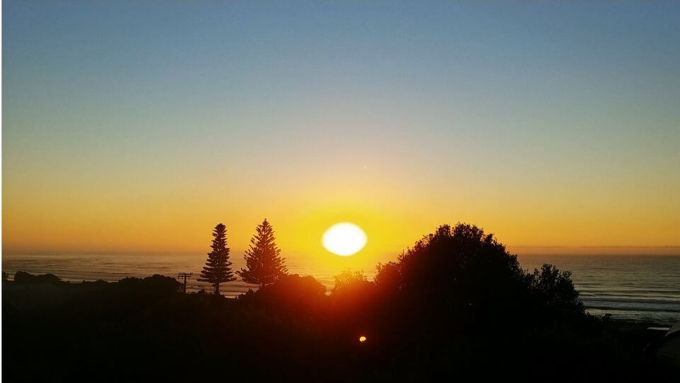 Home sitters reviews-house sitting for friends in Gisborne New Zealand-early morning sunrise view from window