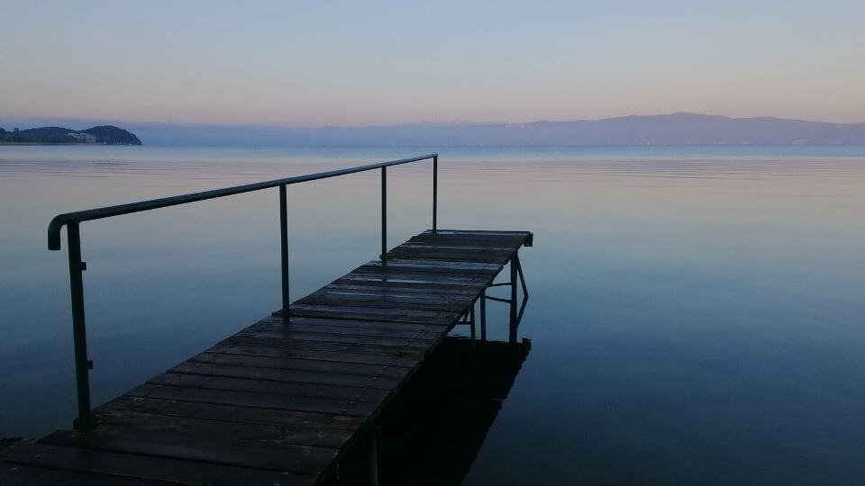 Early morning calm water lake Ohrid