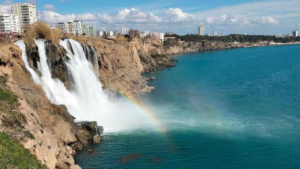 The Duden waterfalls on the Antalya coastline powerfully gushing into the sea below