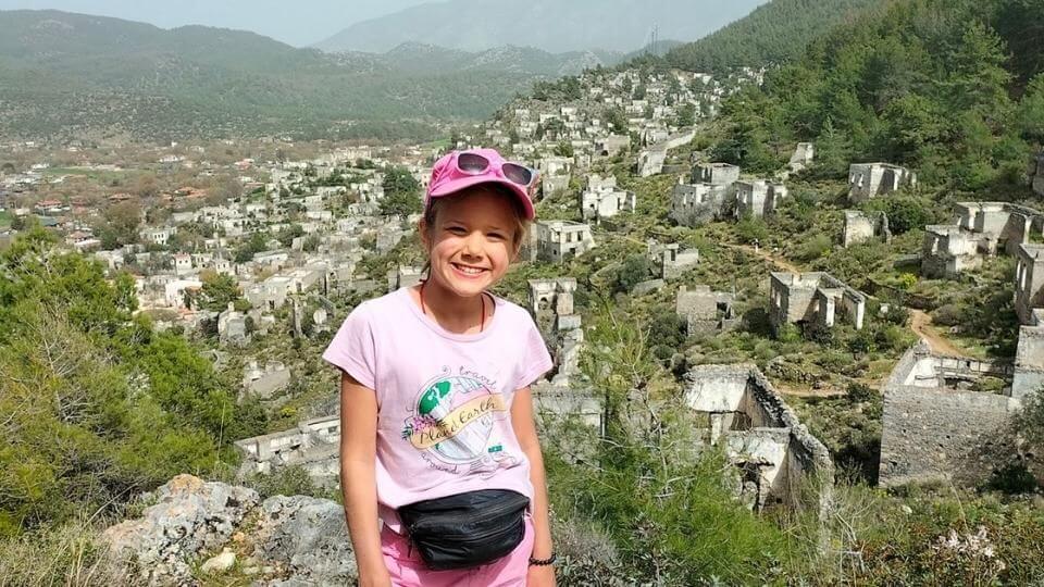 Hiking from Kayakoy to one of the bays is one of the fun things to do in Fethiye-Ayla in front of the Kayakoy ghost town