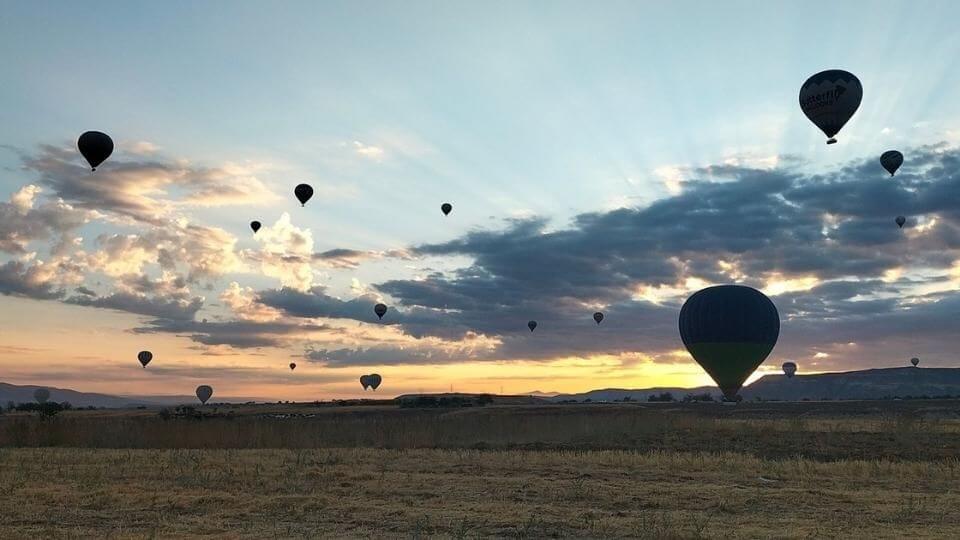 Things to do in Cappadocia-get up early to see the hot air balloons-balloons in the air as the sun rises