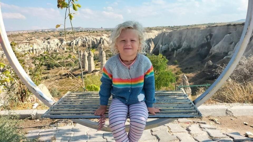 Things to do in Cappadocia-visit love valley-Romy sitting with the valley in the background