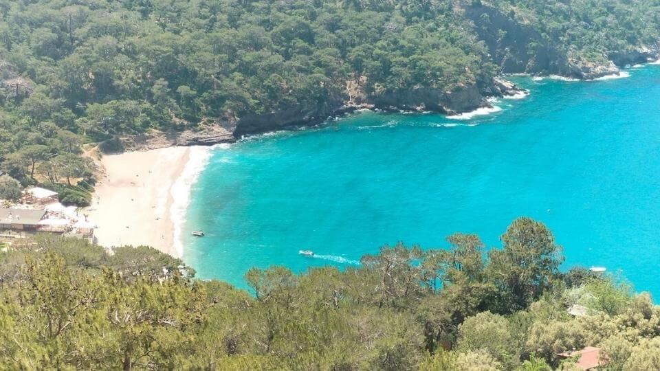 View of the beautiful turquoise water and Kabak beach on the second part of Likya Yola (Lycian way) hiking trail from Faralya to Kabak beach