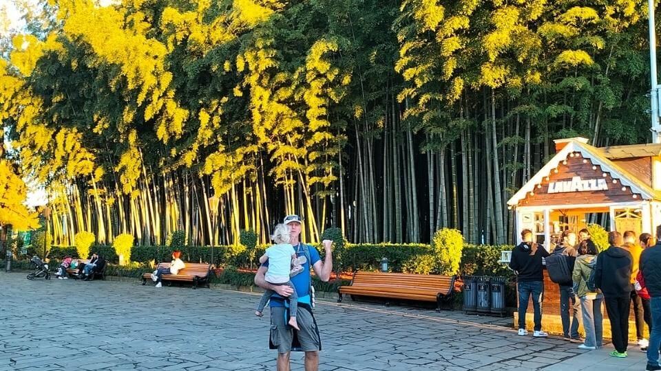 Colin and Romy in front of the large bamboo grove on the Batumi seafront, Georgia.