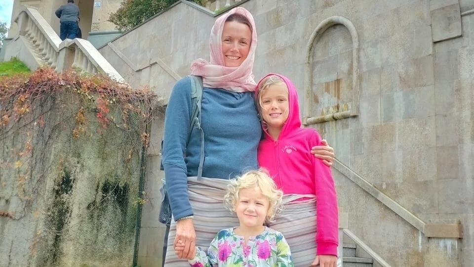 Elly, Ayla, and Romy standing in front of the Sameba (Holy Trinity) church in Batumi, Georgia.