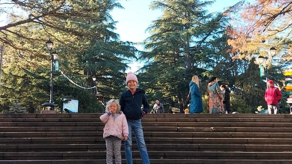 Ayla and Romy on the steps at Mtatsminda park in Tibilisi