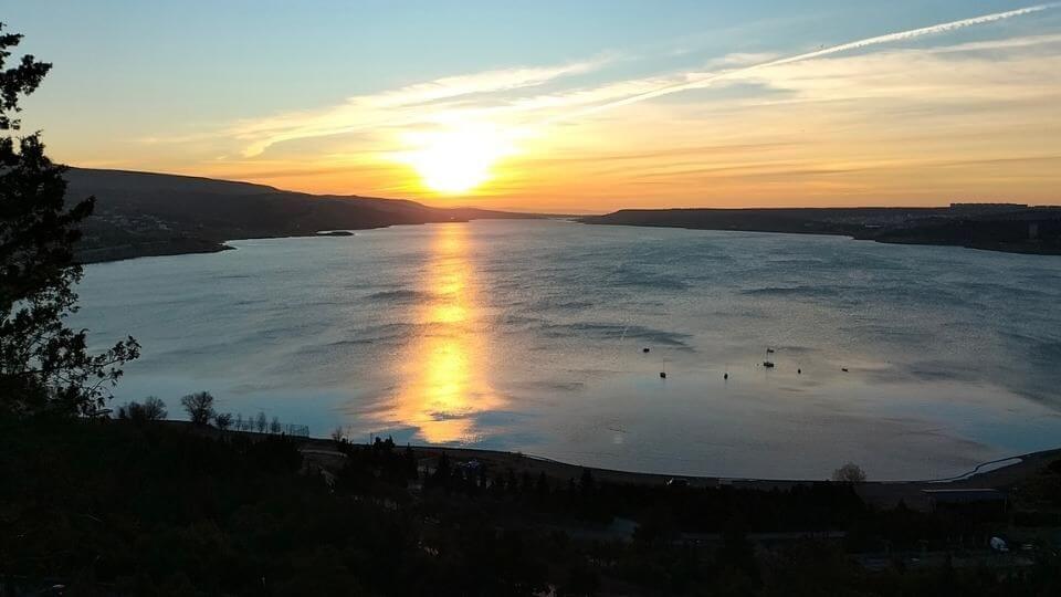 Sunrise over the Tibilisi reservoir, viewed from the Chronicle of Georgia