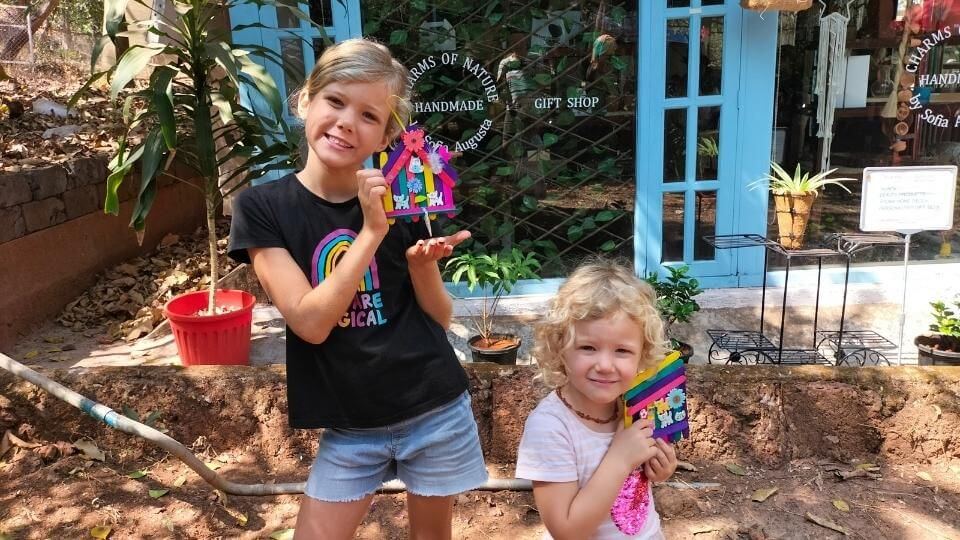 Charms of Nature shop in Anjuna does free Saturday morning art classes for kids-Ayla and Romy with their popsicle stick creations.-1