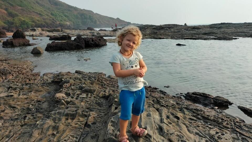 Spend time watching crabs and hopping across the rocks at Anjuna beach