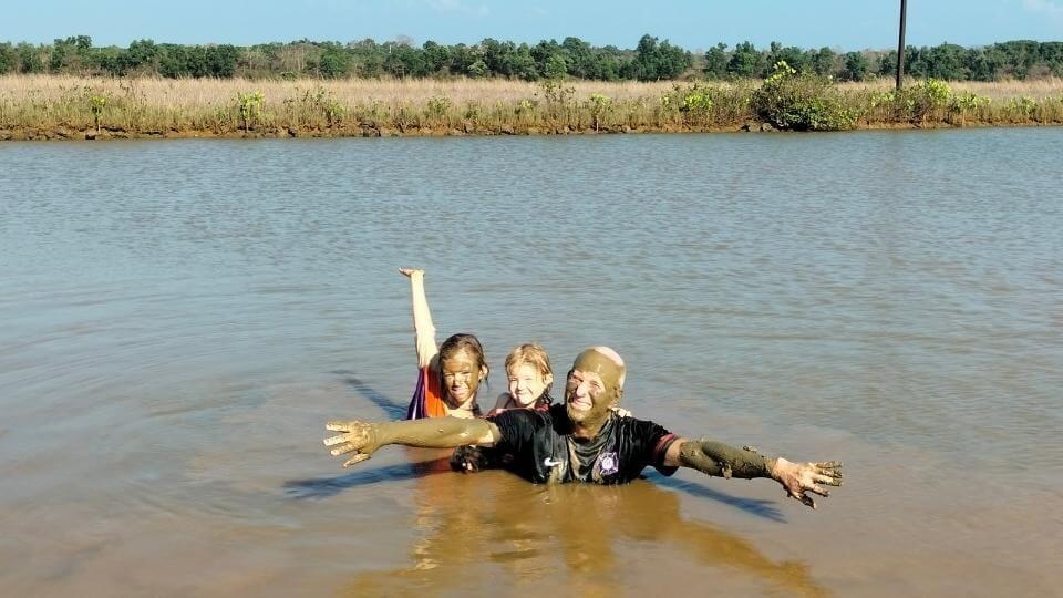 Swim in a lake an enjoy the mud at Divar Island in North Goa.