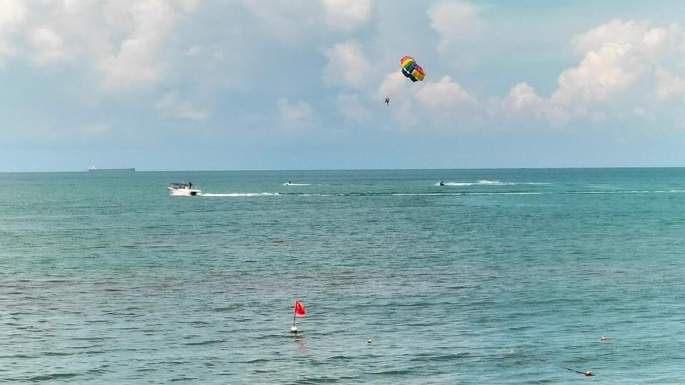 You can do watersports like parasailing at the Lotus Desaru Resort.