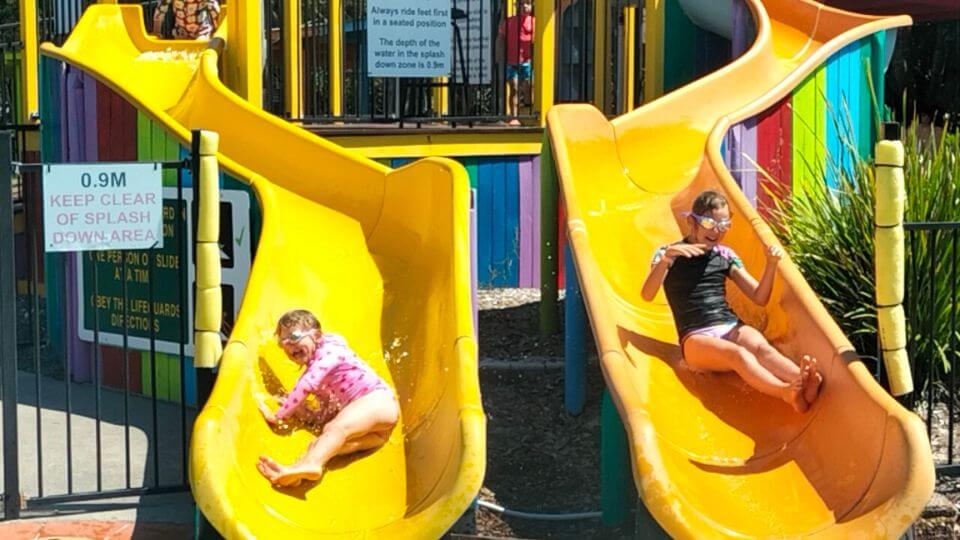 Ayla and Romy on the waterslides at the Plantation Aquatic Centre in Gumdale.