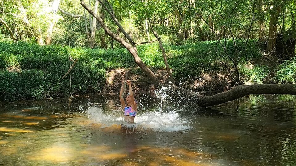 Ayla splashes into the water on a small swing at the Boorabbin Picnic Ground Park in Wishart.