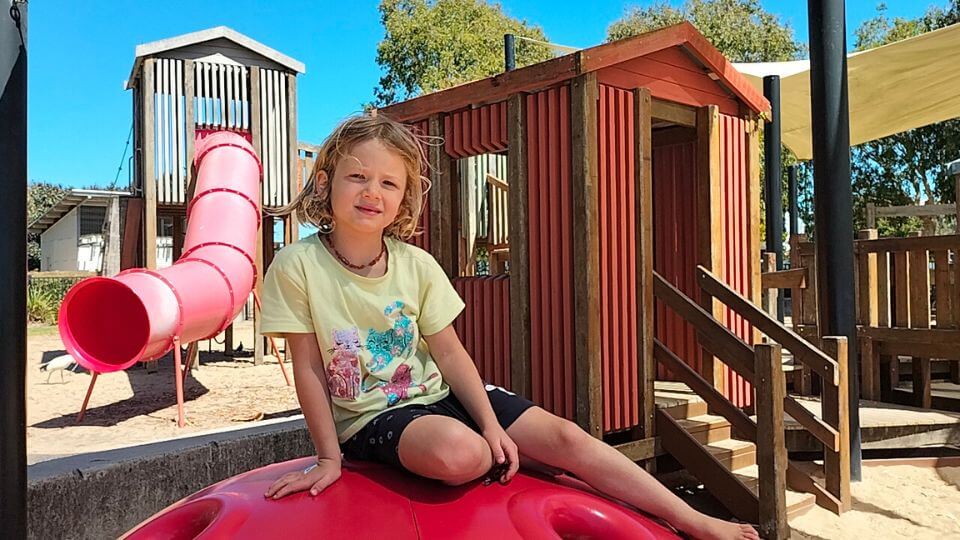 Romy on the play equipment at Airlie's Playground in Lota, on Brisbane's Bayside.