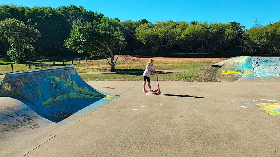 Romy riding her scooter at the skate park at Moore Park beach near Bundaberg.