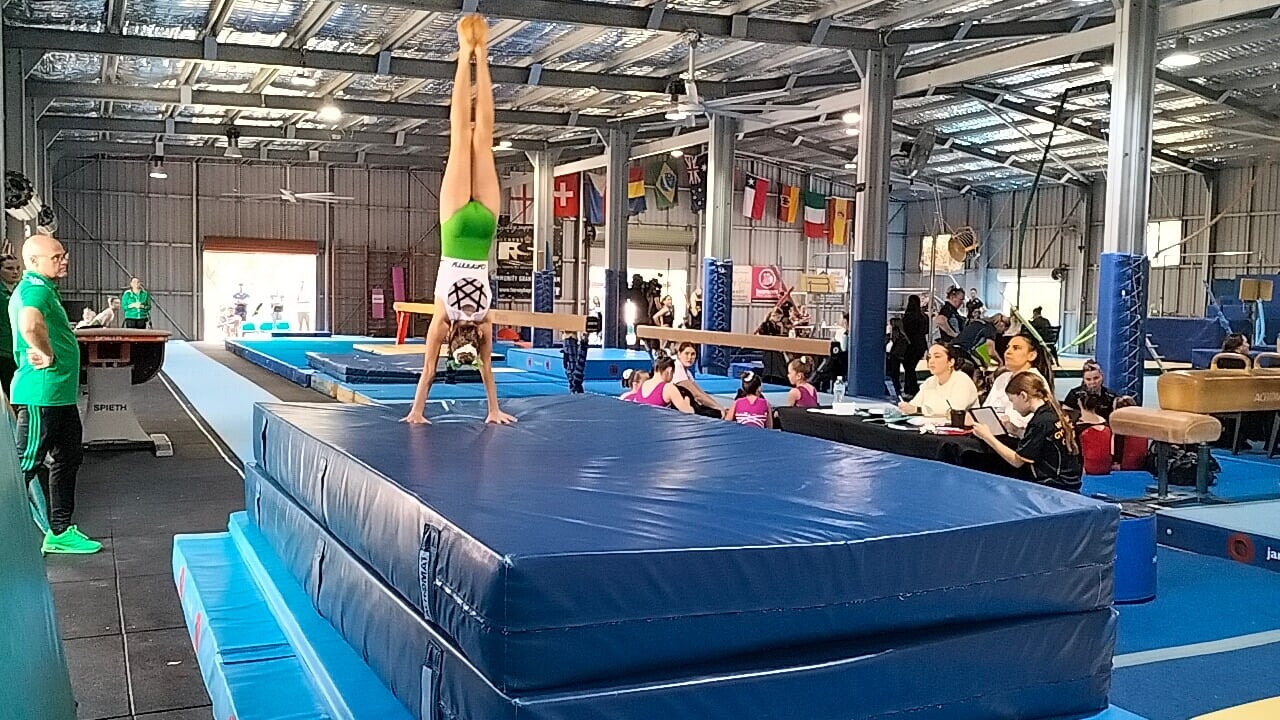 Ayla mid-vault at the Wide Bay Invitational gymnastics competition in Hervey Bay, Queensland, 2025.