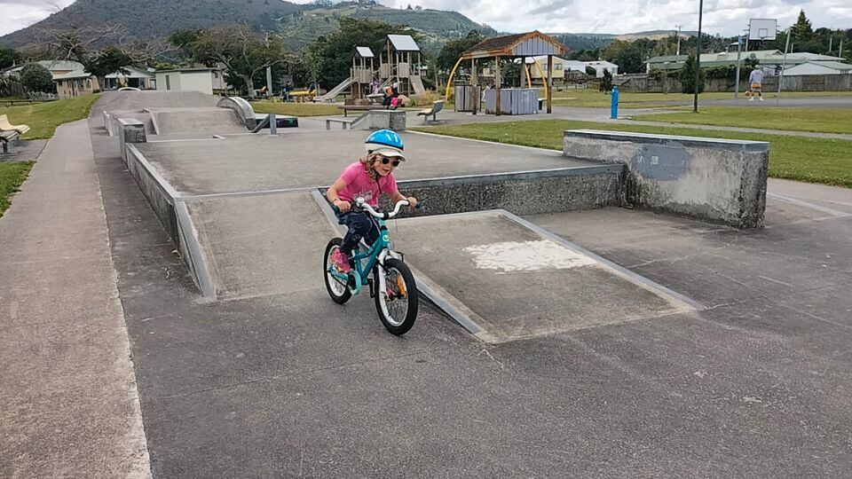 Romy rides her bike in a small skatepark at the Karenga Park Reserve in Koutu, Rotorua.