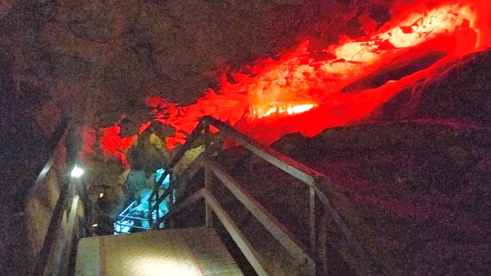 A red light lights up a section of the cave on the Cathedral Cave Tour at the Capricorn Caves near Rockhampton.