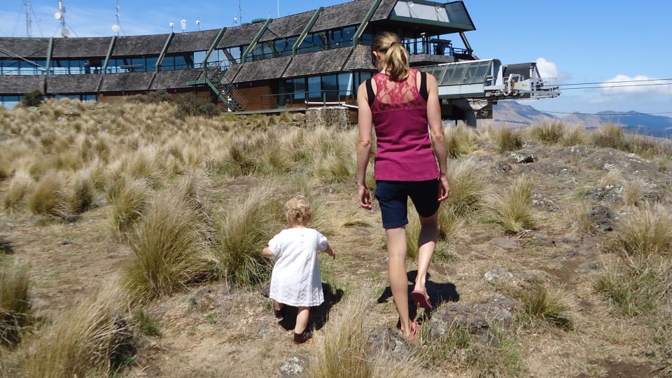 Ayla and Elly walk around the grasslands at the top of the Christchurch Gondola.