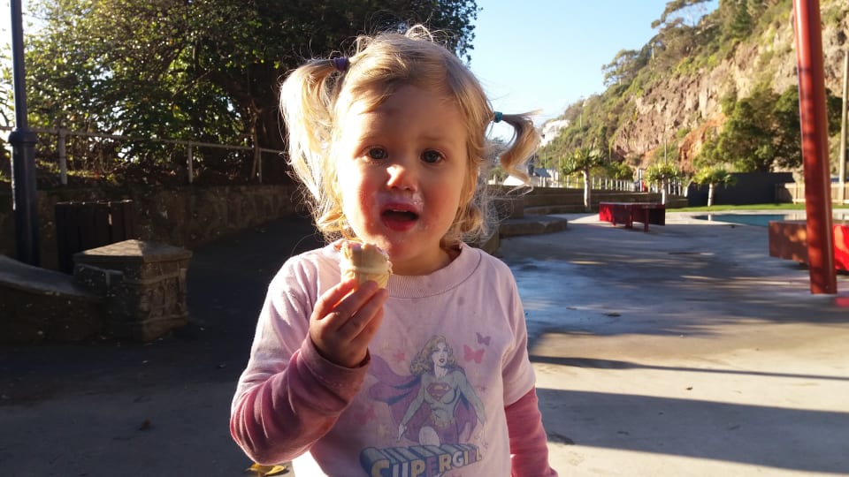 Ayla enjoys an icecream at Sumner Beach in Christchurch