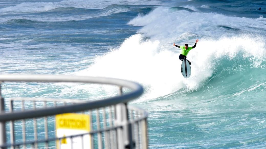 Dynamic capture of a surfer riding the waves at St Clair Beach in Dunedin, New Zealand.