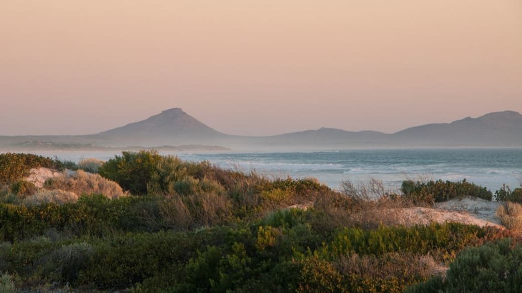 Tranquil beach scene at sunset in Esperance, WA, Australia, revealing stunning coastlines.