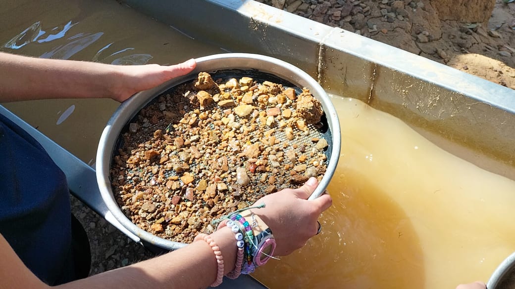Washing out the dirt at Pats Gems Tourist Fossicking Park and Cafe in Sapphire.