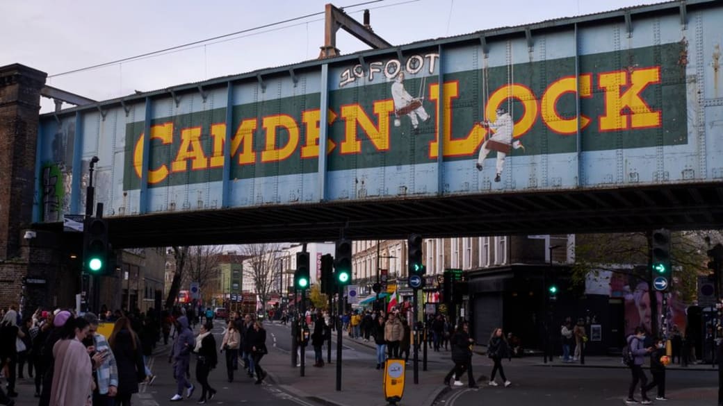 Bustling street scene at Camden Lock in London, capturing the vibrant urban atmosphere.
