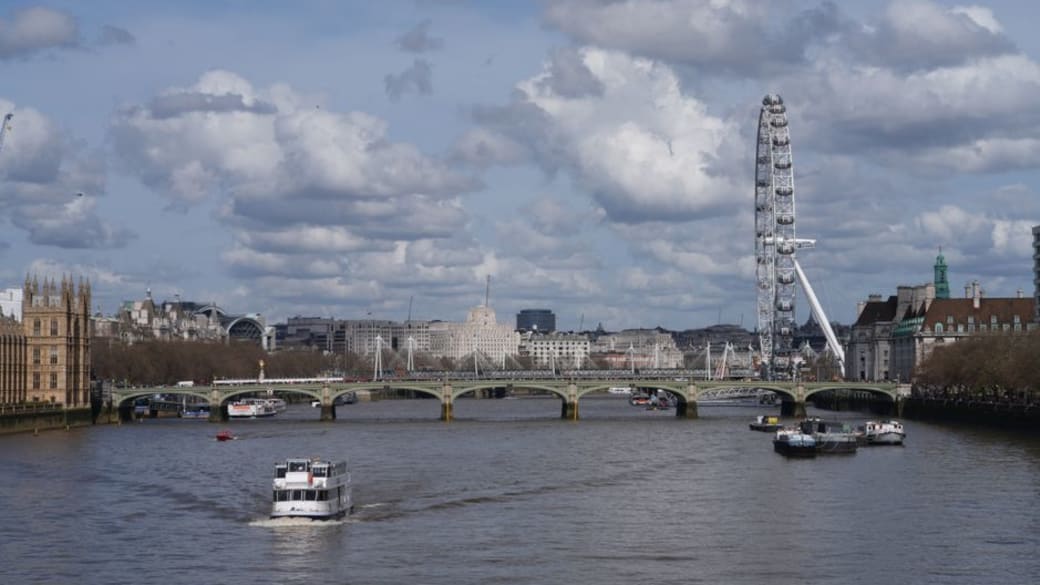 View of London's skyline featuring the River Thames, London Eye, and Westminster.