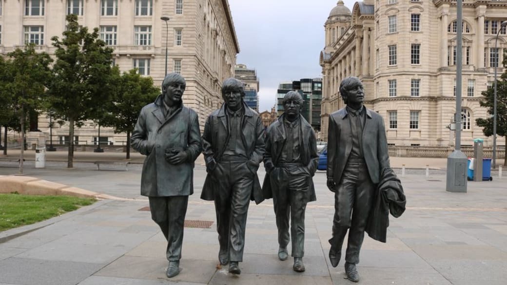 Bronze statues of the famous Beatles band members in Liverpool