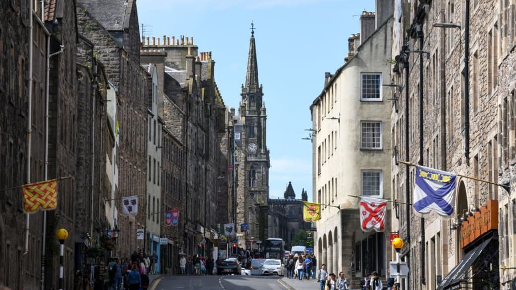 Daytime view of the historic Royal Mile in Edinburgh, capturing its charm and architecture.