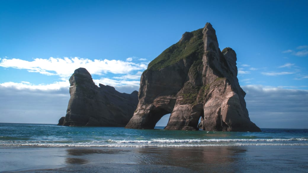 Stunning rock formations at Wharariki Beach at the far end of Golden Bay.